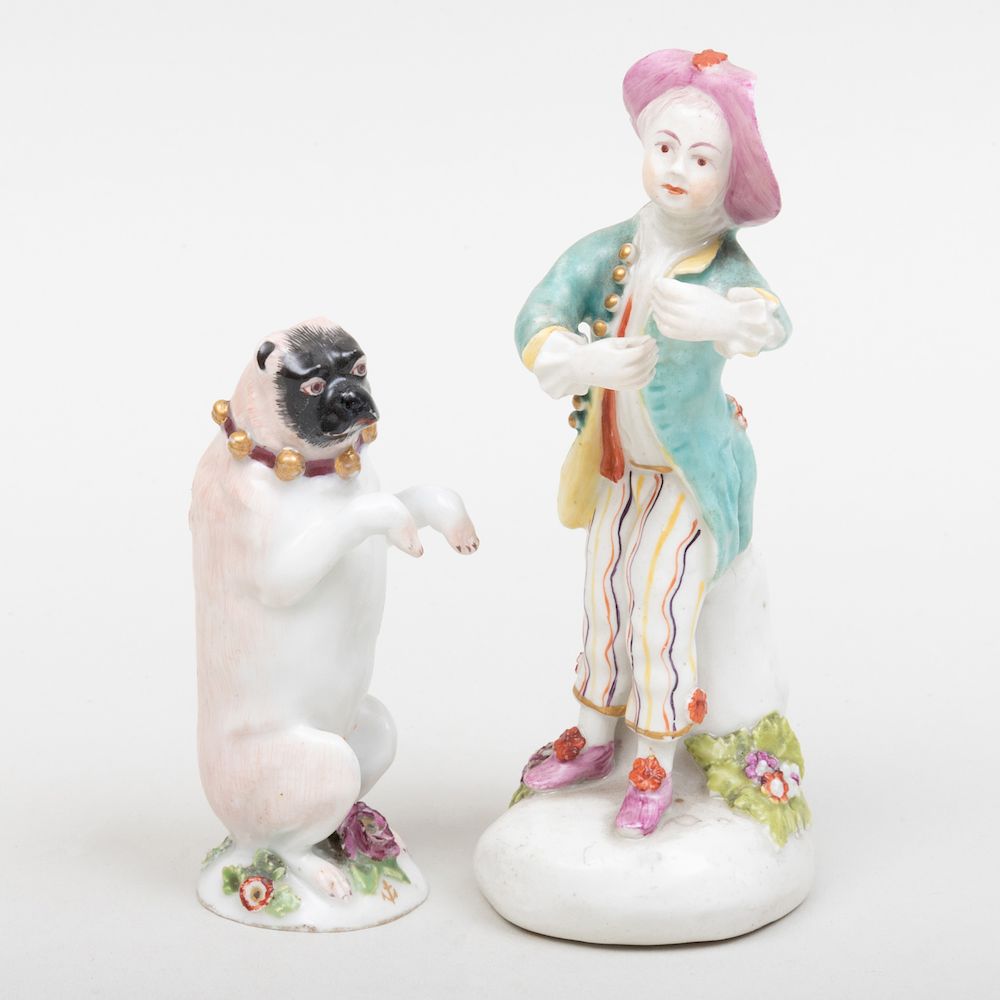 Appraisal: English Porcelain Figure of a Pug and a Boy The