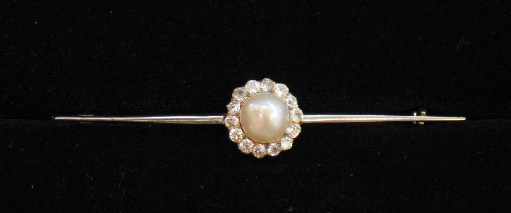 Appraisal: A PEARL AND DIAMOND BAR BROOCH the large central pearl