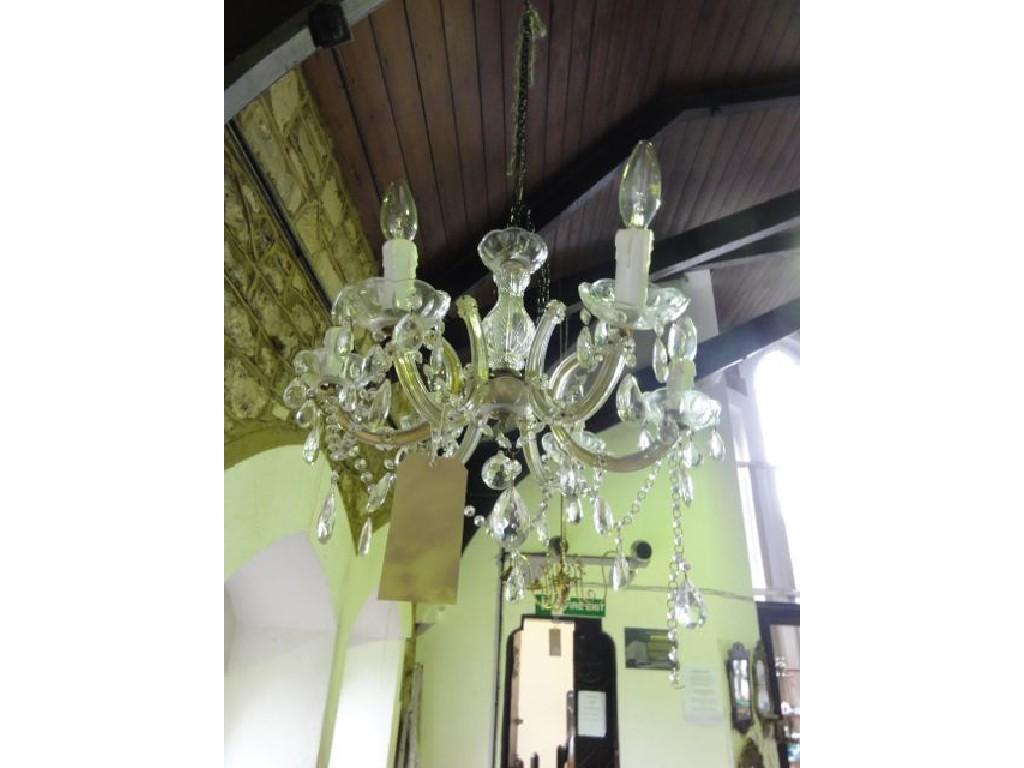 Appraisal: A cut glass six branch chandelier with pear cut drops