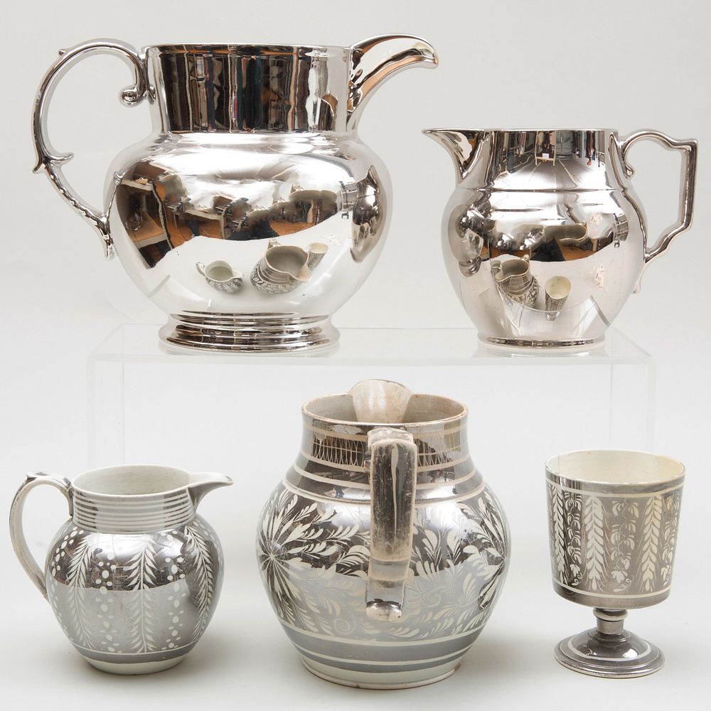 Appraisal: Group of Four Silver Lustreware Pitchers Together with a silver