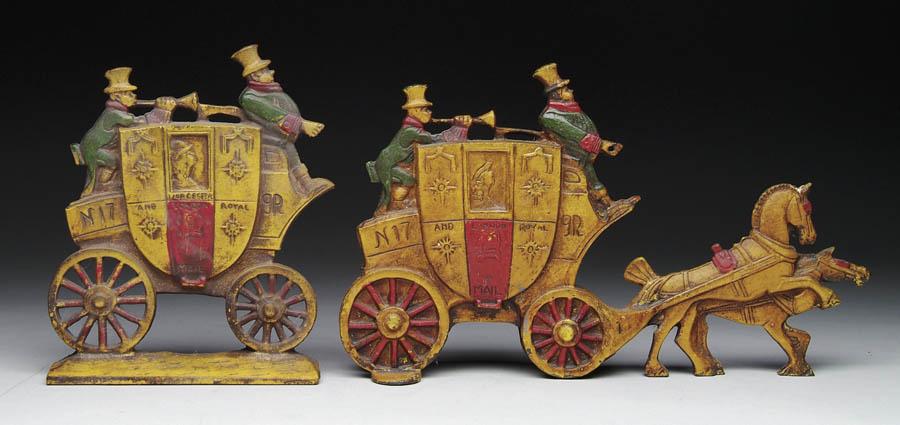 Appraisal: TWO CAST IRON PAINTED DOOR STOPS x horse drawn stagecoach