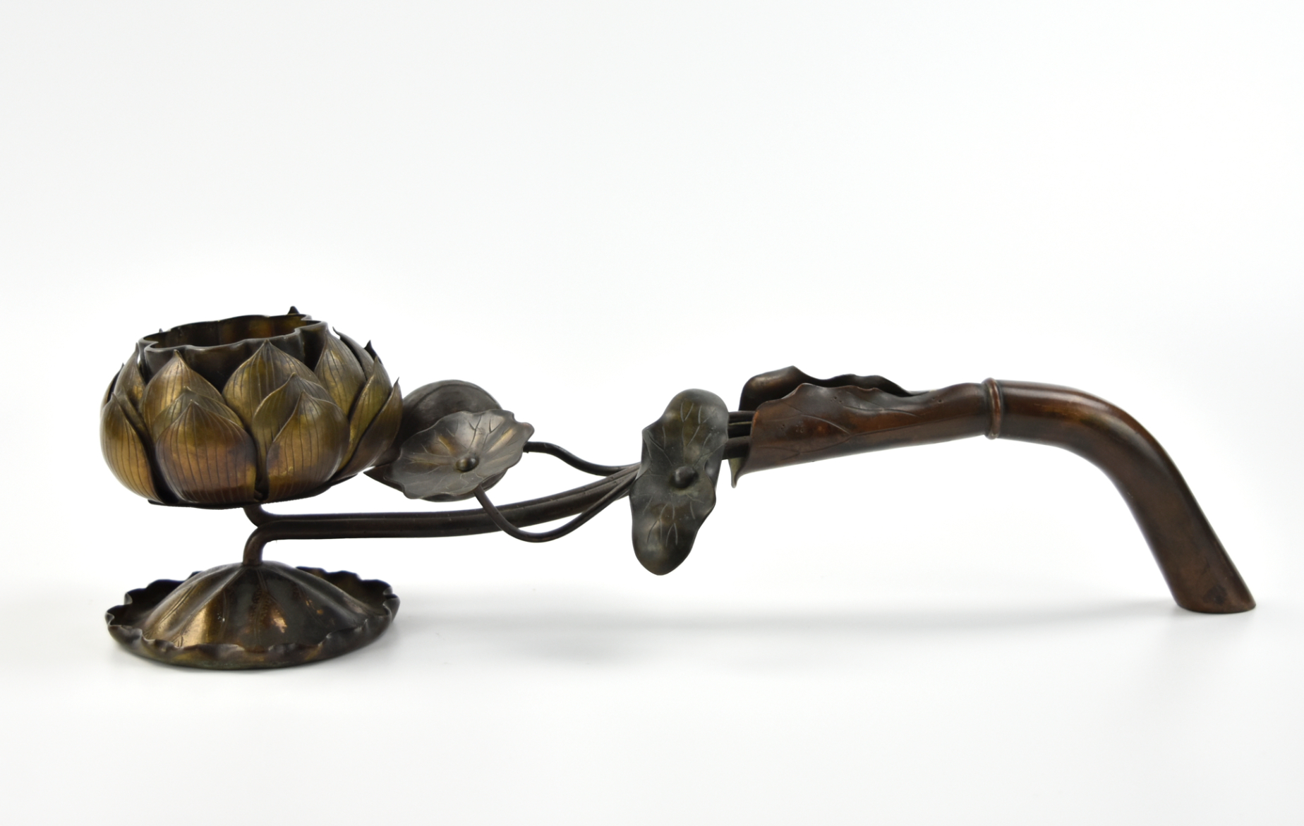 Appraisal: a Japanese th C bronze lotus shaped candle stand sophistcated