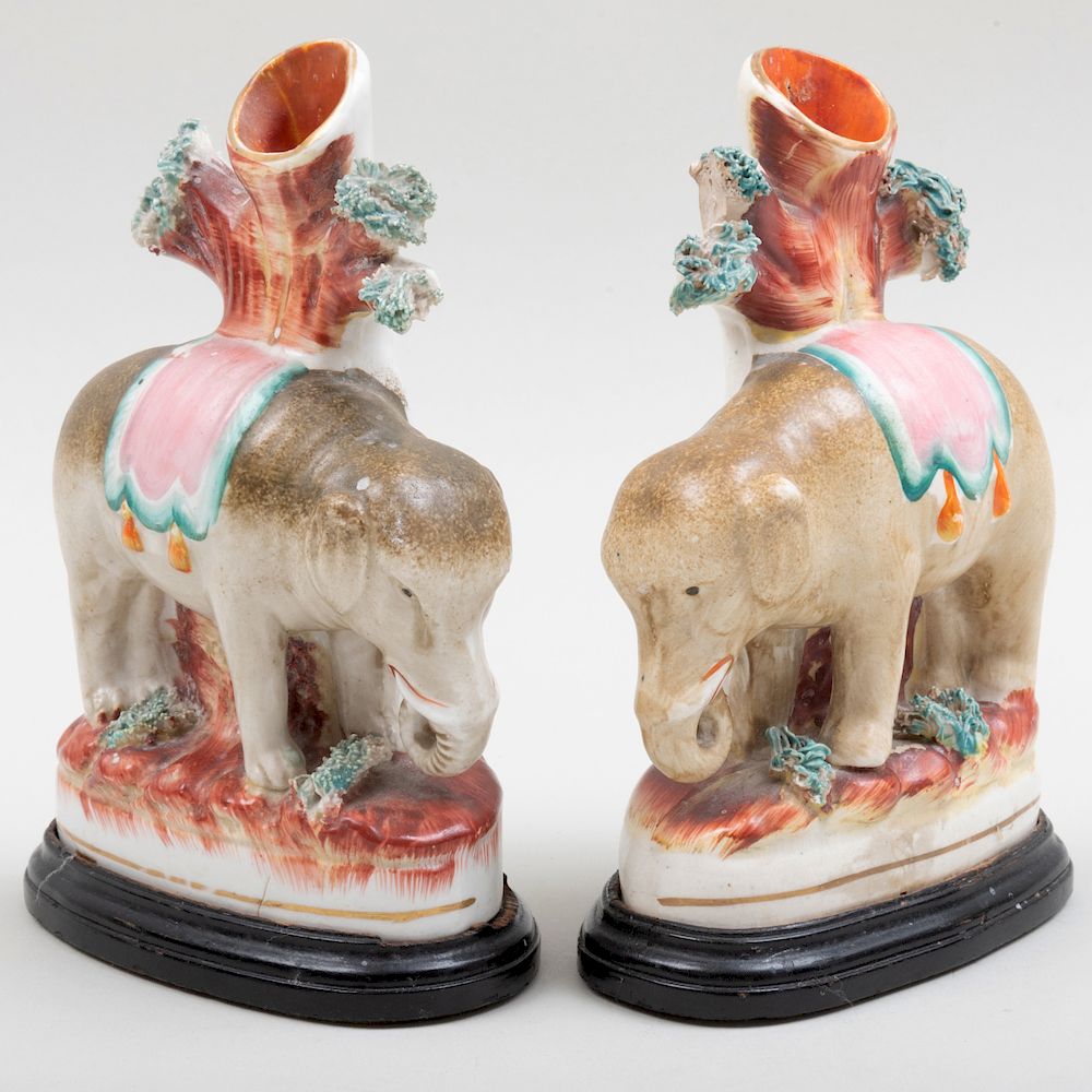 Appraisal: Pair of Staffordshire Elephant Spill Vases in high Condition Each