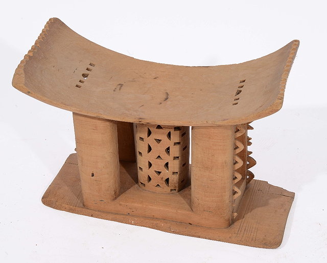 Appraisal: AN OLD AFRICAN TRIBAL STOOL OR HEADREST of bowed form