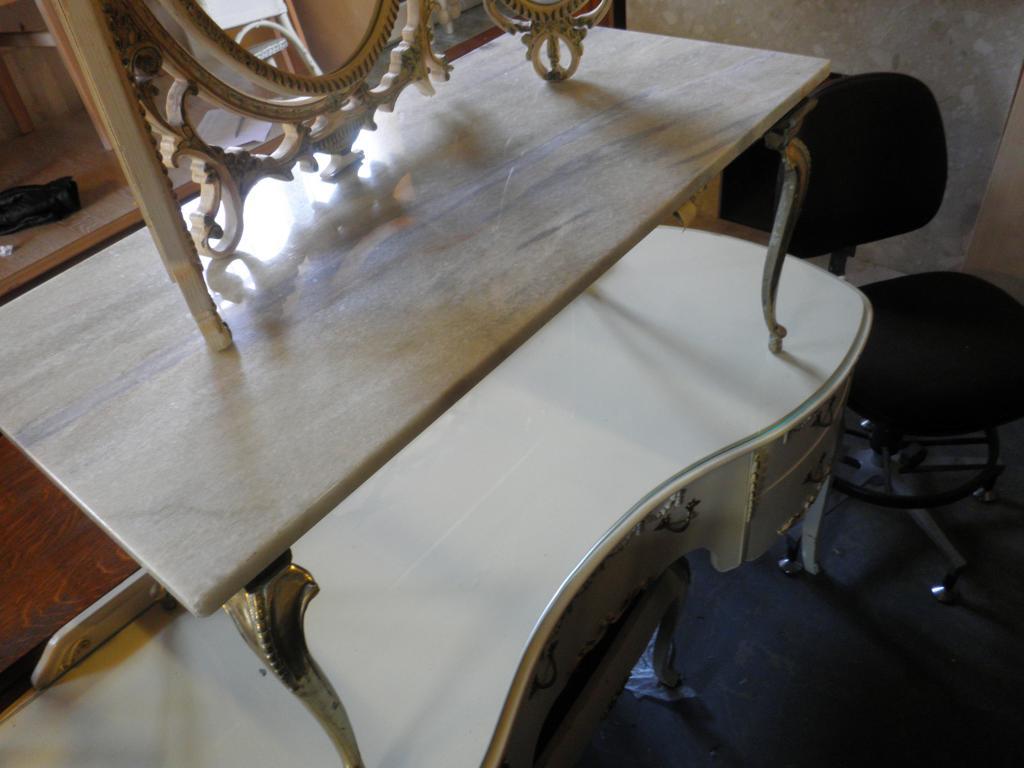 Appraisal: A swivel office chair a white painted dressing table stool