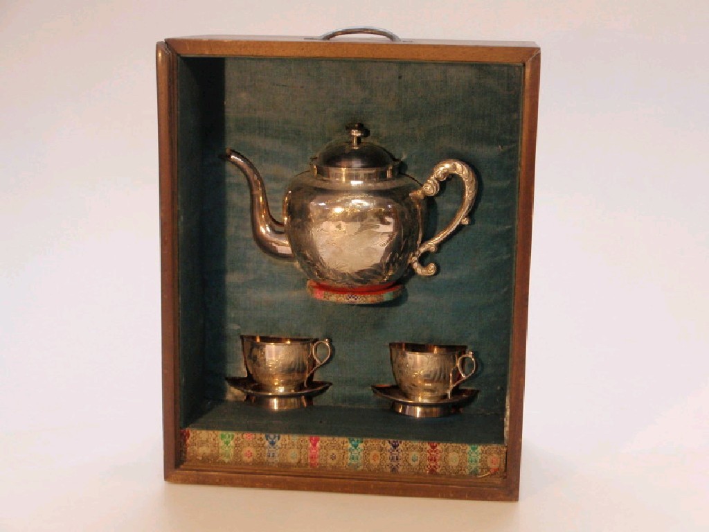 Appraisal: A thC Chinese silver tea pot and a pair of