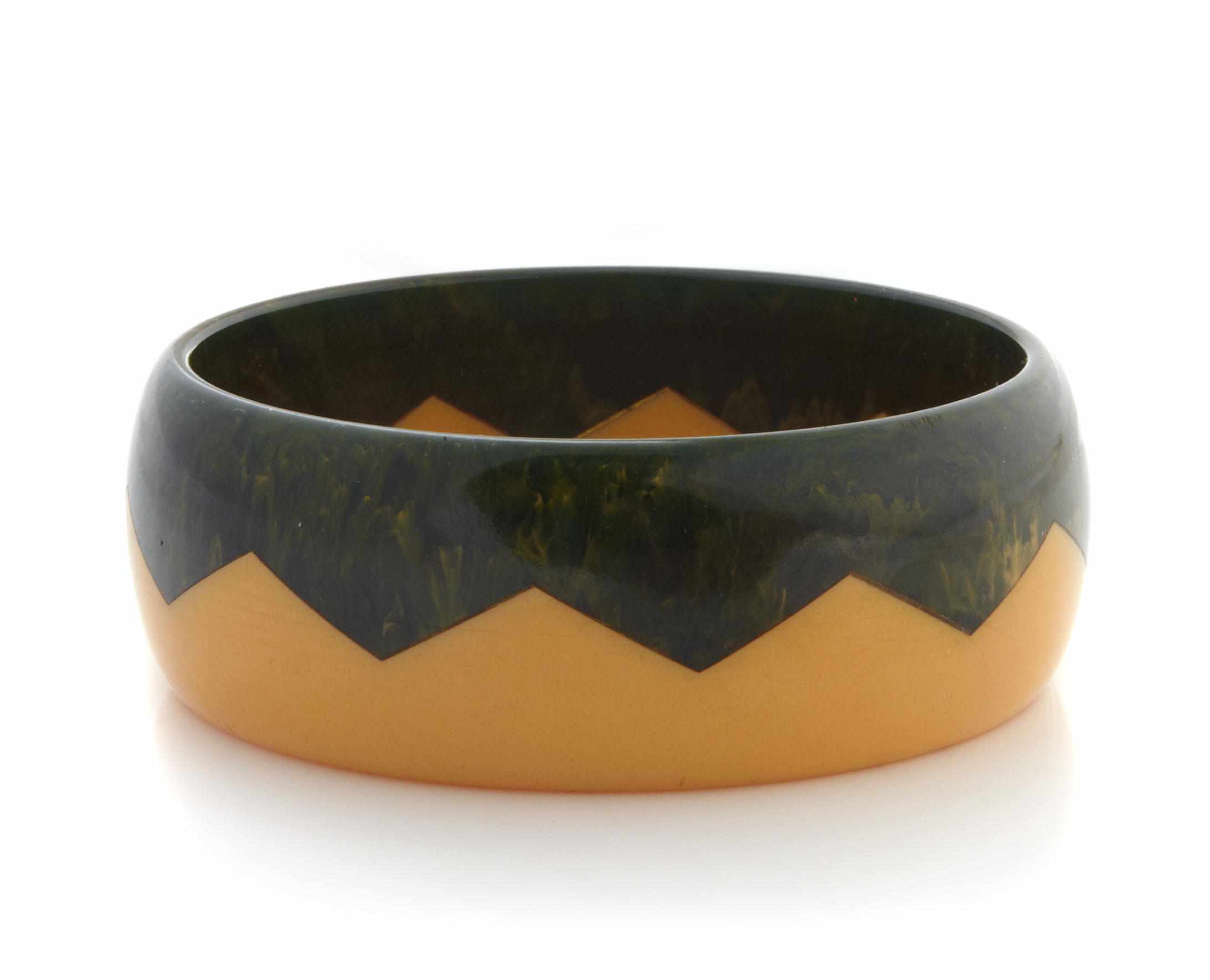 Appraisal: Three Bakelite ''zigzag'' bangle bracelets each diameter in