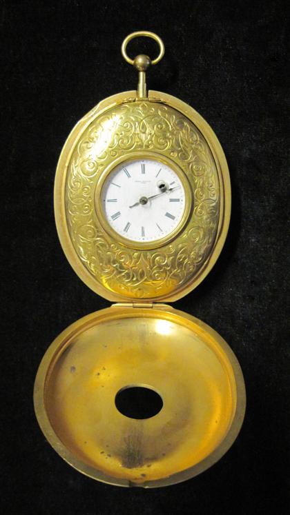 Appraisal: Oval folding table clock with alarm Gerrd Holdeckswiss th century