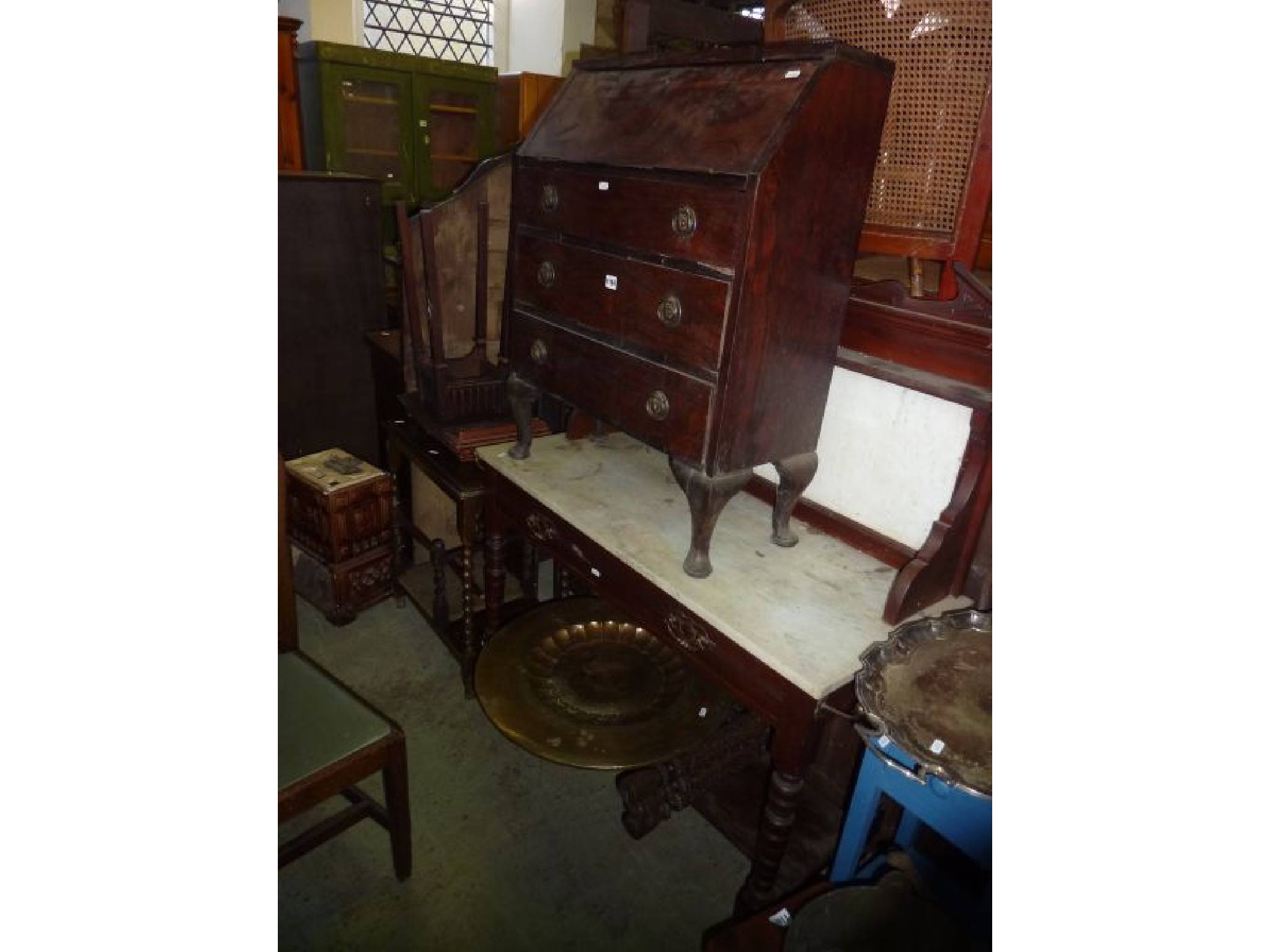 Appraisal: A small rosewood veneered bureau of three long drawers together