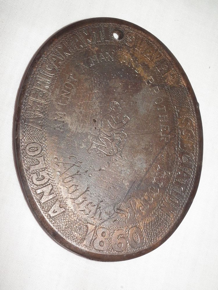 Appraisal: ANTI-SLAVERY MEDAL Oval medallion in bronze with engraved chained man