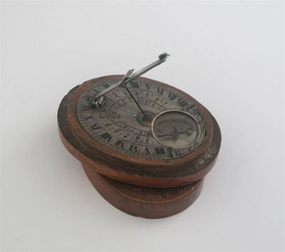 Appraisal: An th century pocket string-gnomon dial oval with enamelled numerals