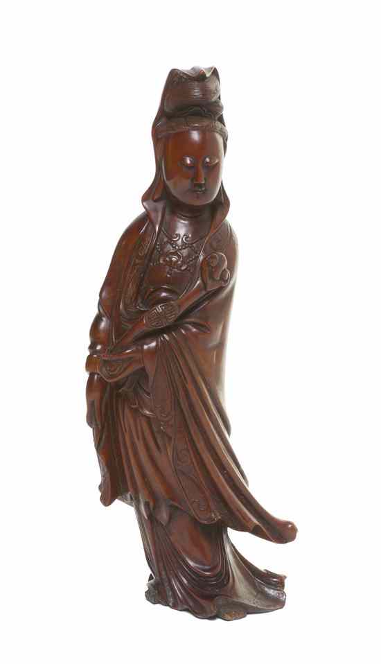 Appraisal: A Chinese Carved Hardwood Figure of Guanyin th th century