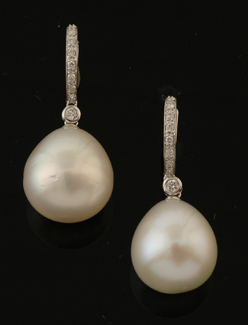 Appraisal: A pair of South Sea pearl and diamond earrings Each