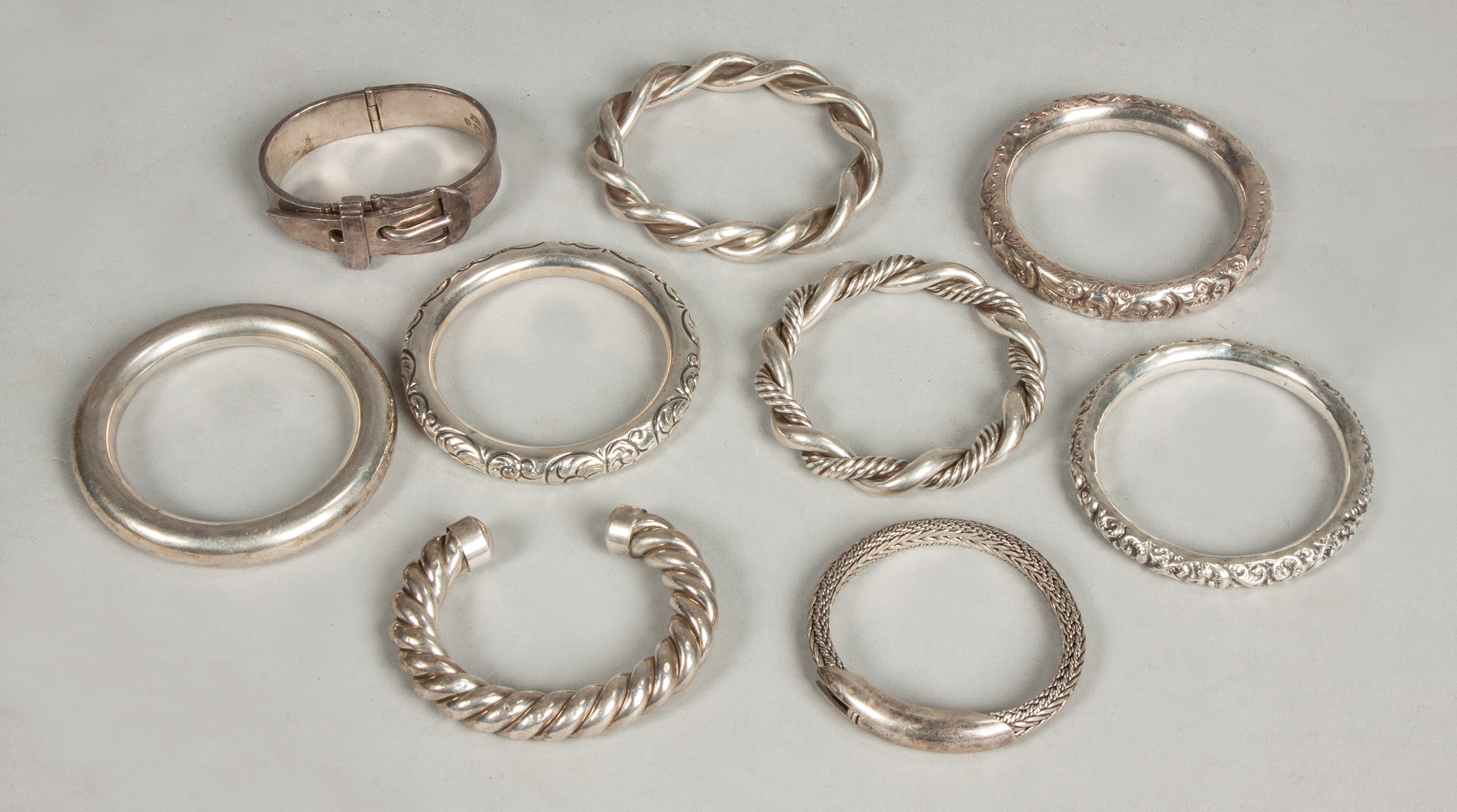 Appraisal: Group of Sterling Vintage Bangle Bracelets One made in Mexico