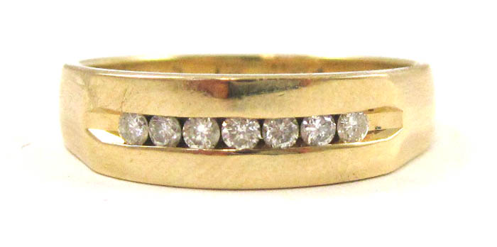 Appraisal: DIAMOND AND FOURTEEN KARAT GOLD RING set with seven round-cut