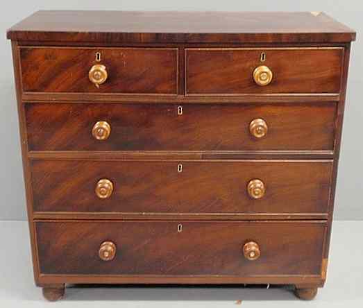 Appraisal: Empire mahogany chest of drawers c with maple knobs As