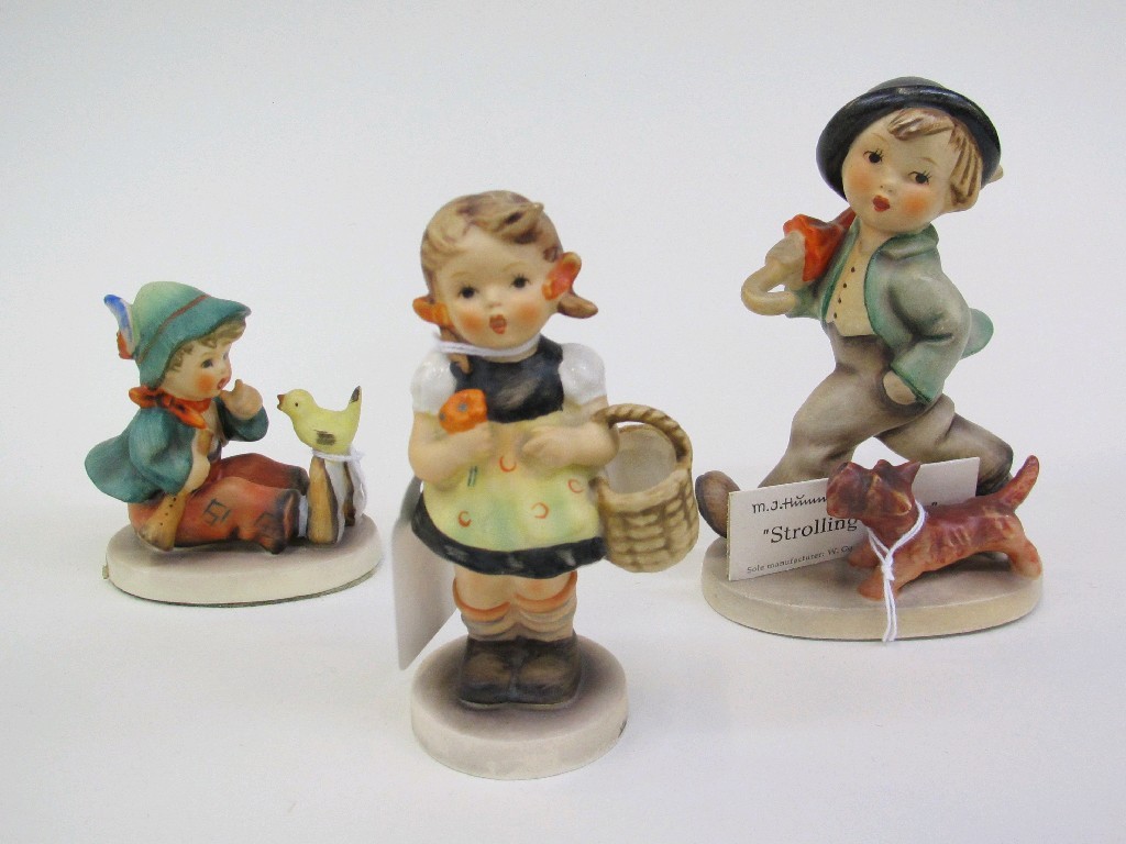 Appraisal: Three Hummel figures Strolling Along TMK Singing Lesson TMK and