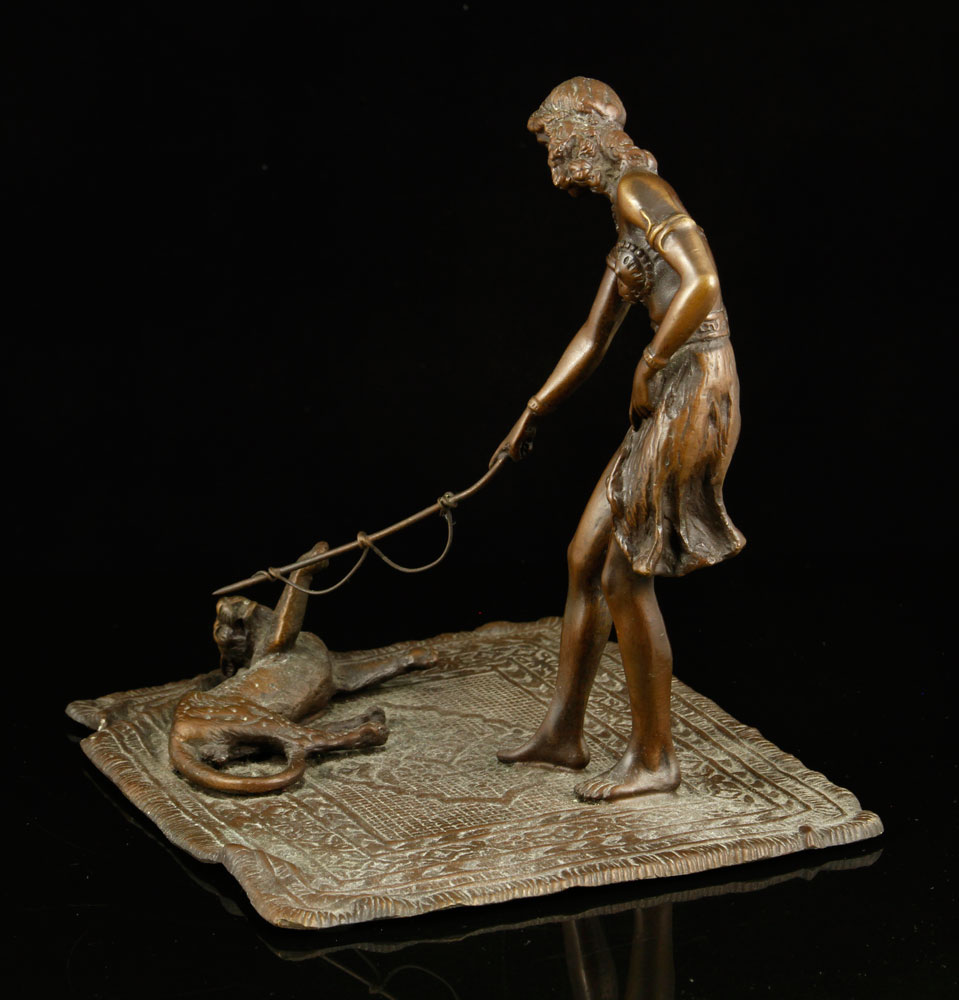 Appraisal: - Woman with Leopard Bronze Woman playing with a leopard