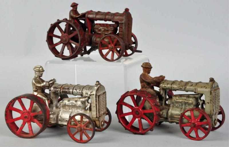 Appraisal: Lot of Cast Iron Arcade Tractor Toys American Includes one