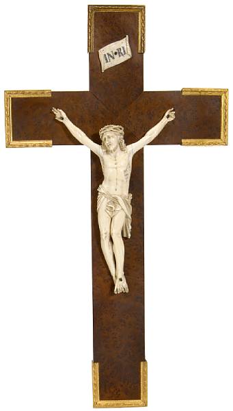 Appraisal: A French carved ivory and thuya wood crucifix late th