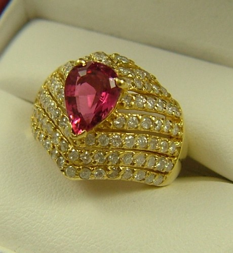 Appraisal: PINK TOURMALINE AND DIAMOND RING K yellow gold set with