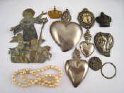 Appraisal: A number of white metal untested votive offerings pendants and