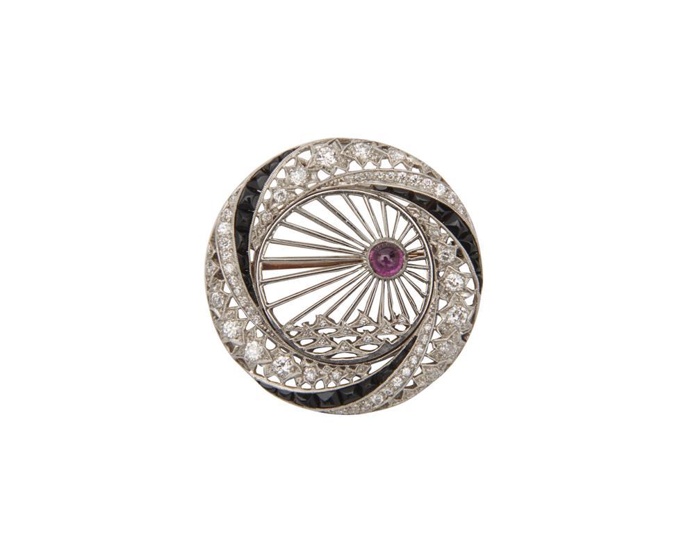 Appraisal: TIFFANY CO Platinum Diamond Onyx and Ruby Brooch the circle