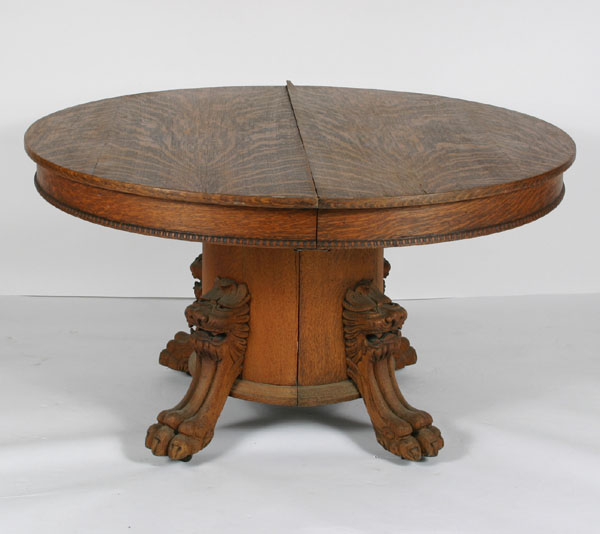 Appraisal: Round oak table expanding center pedestal and four brace legs