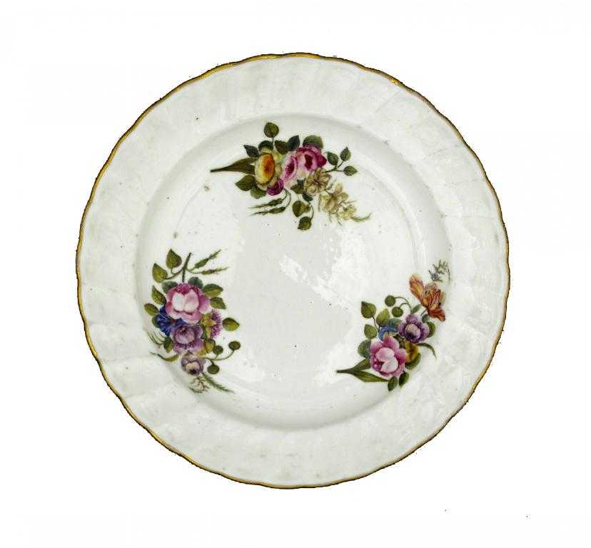 Appraisal: A PINXTON PLATE painted with three groups of flowers each