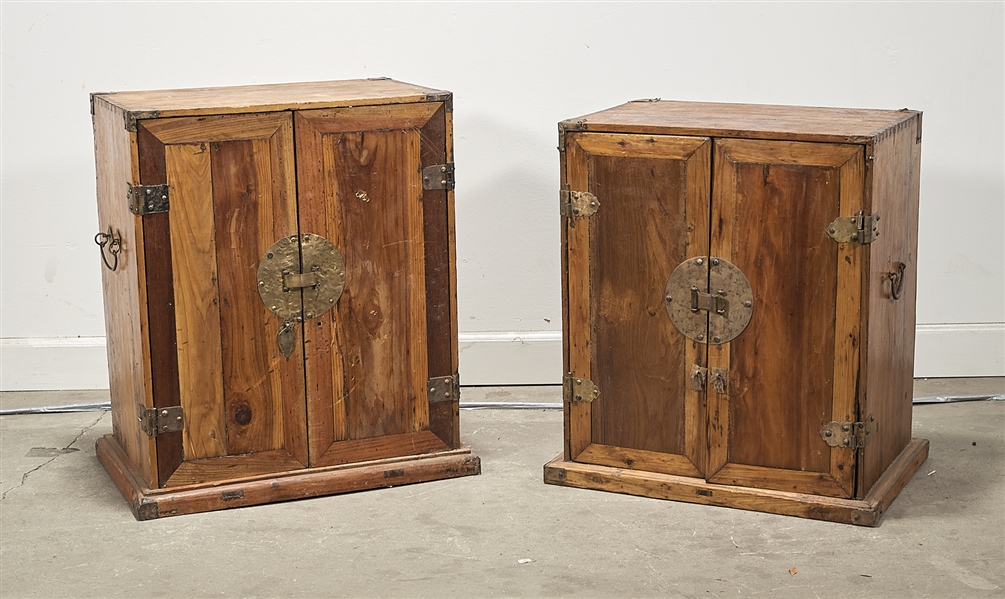 Appraisal: Two Chinese wood cabinets two drawers and two shelves to