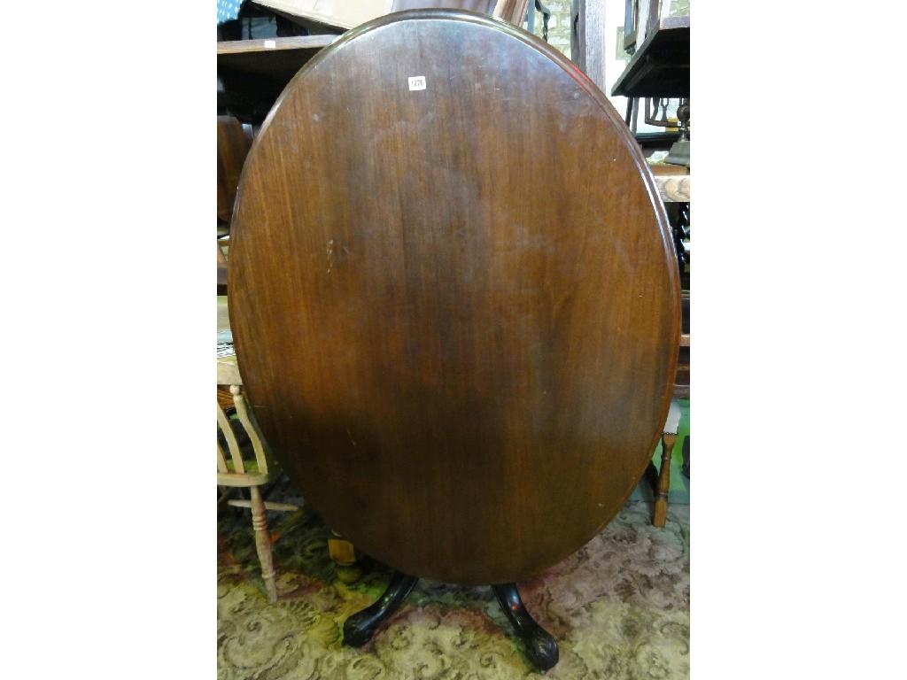 Appraisal: A Victorian walnut tilt top breakfast table of oval form