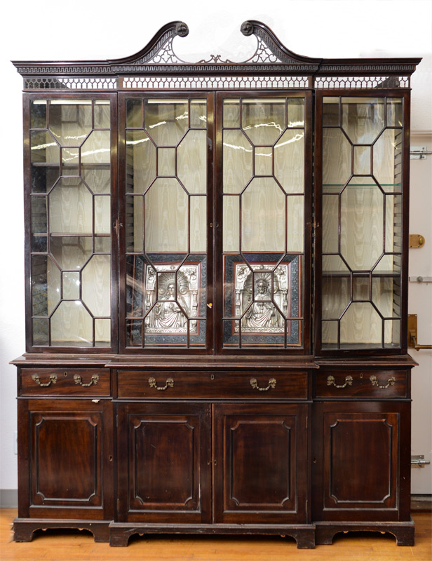 Appraisal: CHIPPENDALE STYLE LARGE BREAKFRONT BOOKCASE Stepped front carved and pierced