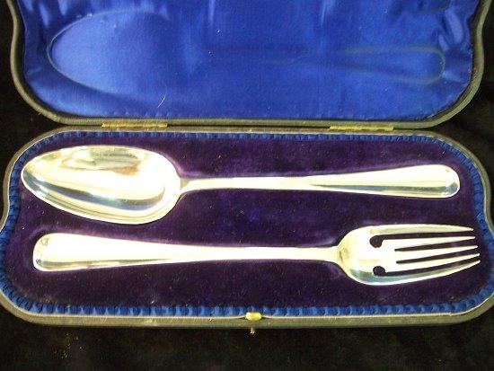 Appraisal: A serving spoon and fork by George Maudsley Jackson and