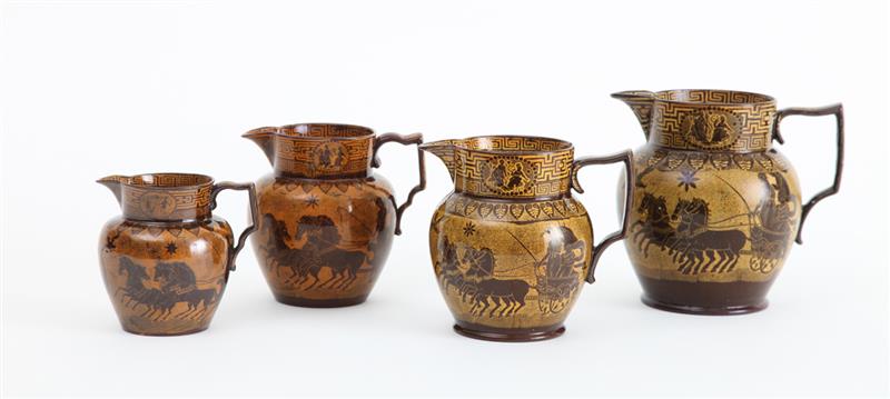 Appraisal: FOUR STAFFORDSHIRE BROWN-GLAZED ORANGE AND YELLOW TRANSFERWARE DECORATED HERCULANEUM JUGS