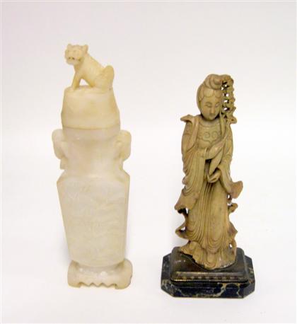 Appraisal: Chinese soapstone figure and covered vase The figure carved with