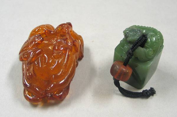 Appraisal: Property from another owner The first an amber decoration carved