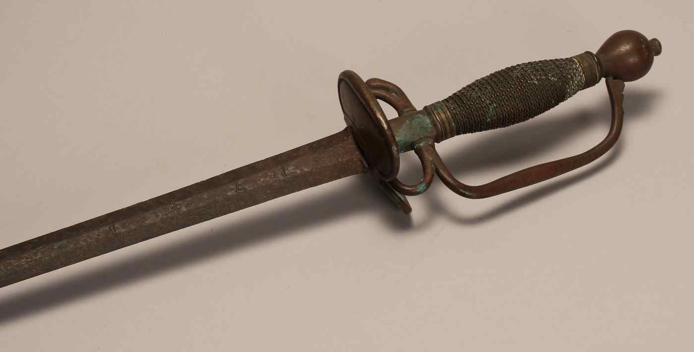 Appraisal: REVOLUTIONARY WAR-ERA SWORDHandle wrapped with brass wire Blade stamped ''