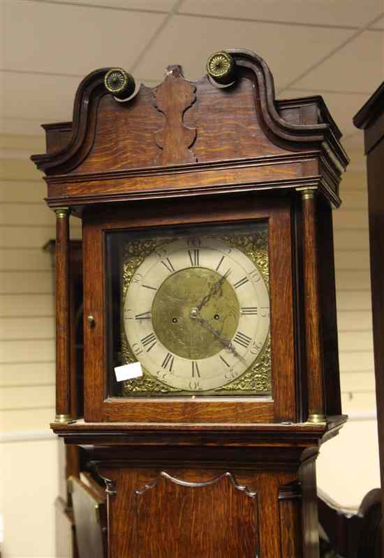 Appraisal: An th century oak eight day longcase clock with brass