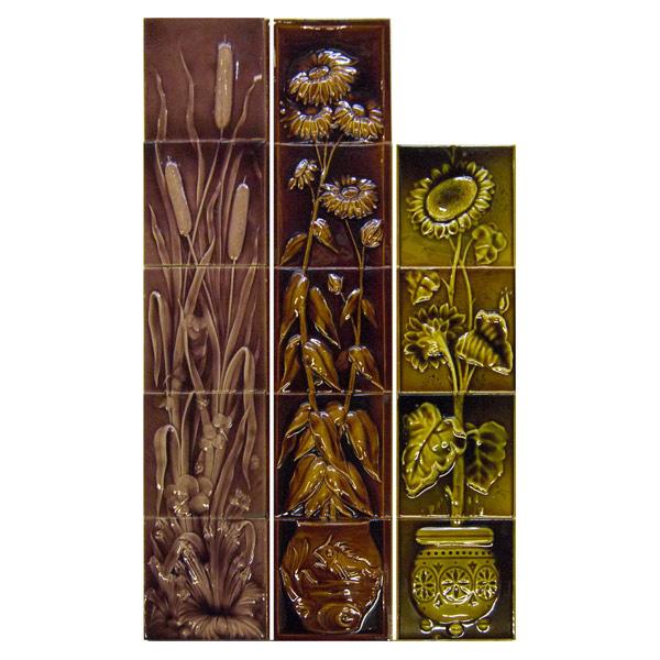 Appraisal: AMERICAN ENCAUSTIC TILING CO Three vertical friezes cattails sunflowers and