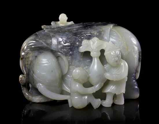 Appraisal: A White and Grey Jade Model of an Elephant depicting