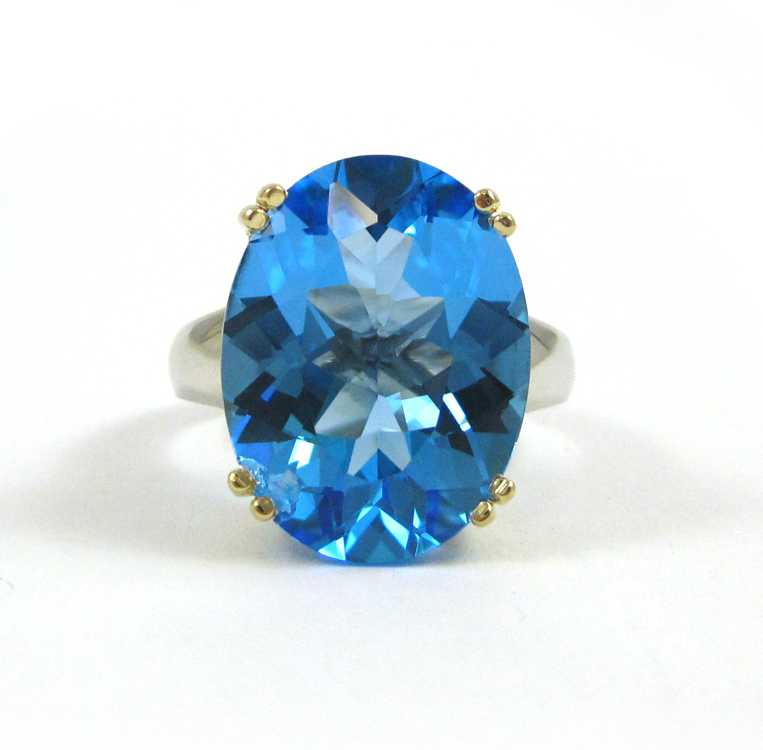 Appraisal: BLUE TOPAZ AND FOURTEEN KARAT GOLD RING The white and