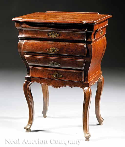 Appraisal: A Louis XV Carved Mahogany Table en Chiffonni re mid-