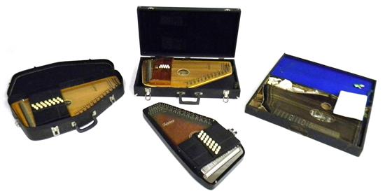 Appraisal: MUSICAL INSTRUMENTS Zither and three autoharps late th early th