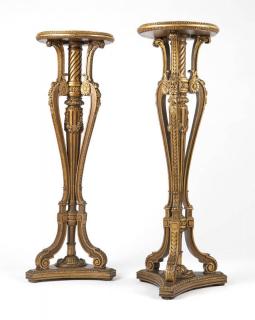 Appraisal: Two carved and giltwood pedestal stands Circa turn of the