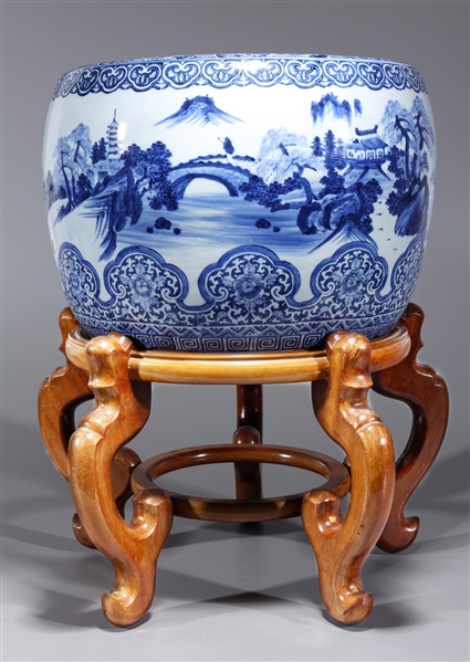 Appraisal: Large Japanese blue and white porcelain hibachi with wood stand