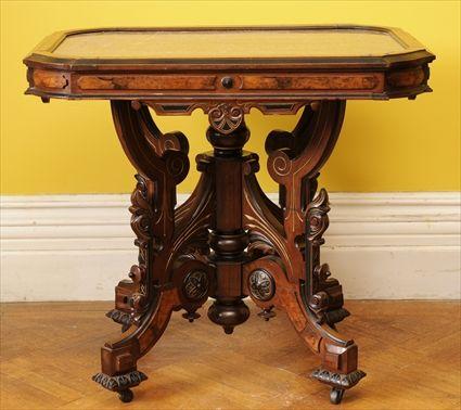 Appraisal: AMERICAN RENAISSANCE REVIVAL PART-EBONIZED AND GILT-INCISED WALNUT MARBLE-TOP CENTER TABLE