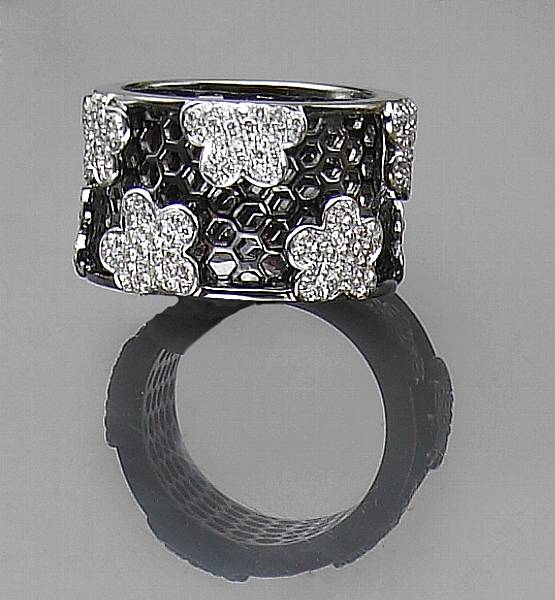 Appraisal: A diamond and k gold black rhodium band size in