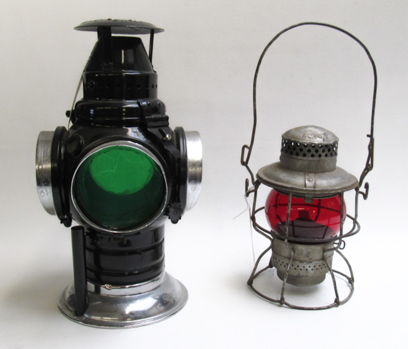 Appraisal: TWO VINTAGE RAILROAD LANTERNS black -lens lantern The Non Sweating