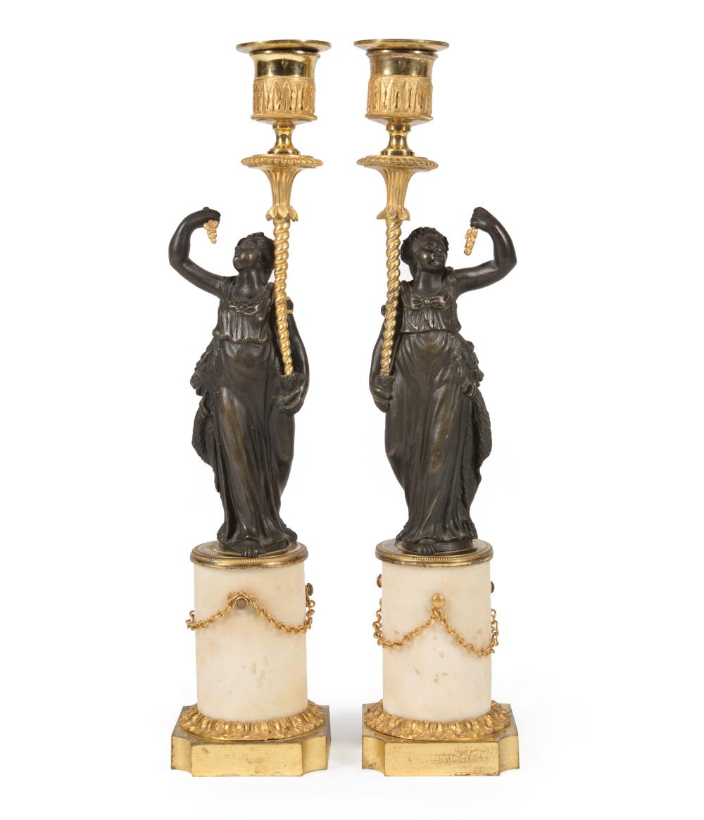 Appraisal: Pair of Gilt and Patinated Bronze Figural Candlesticks early th