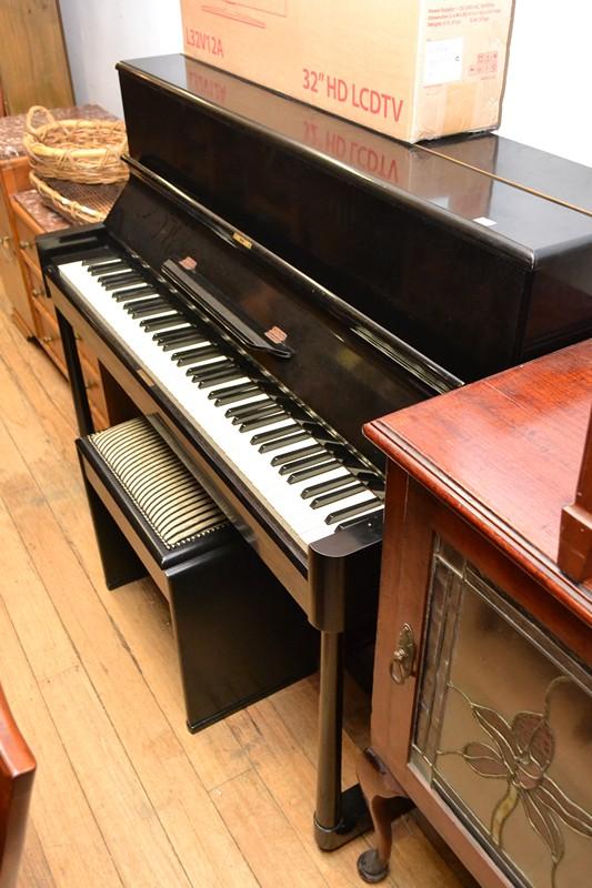 Appraisal: AN UPRIGHT PIANO